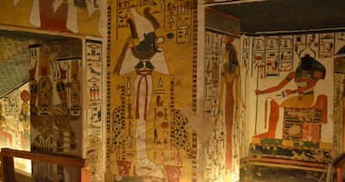 Desert landscape of the Valley of the Queens in Luxor with tomb entrances carved into cliffs